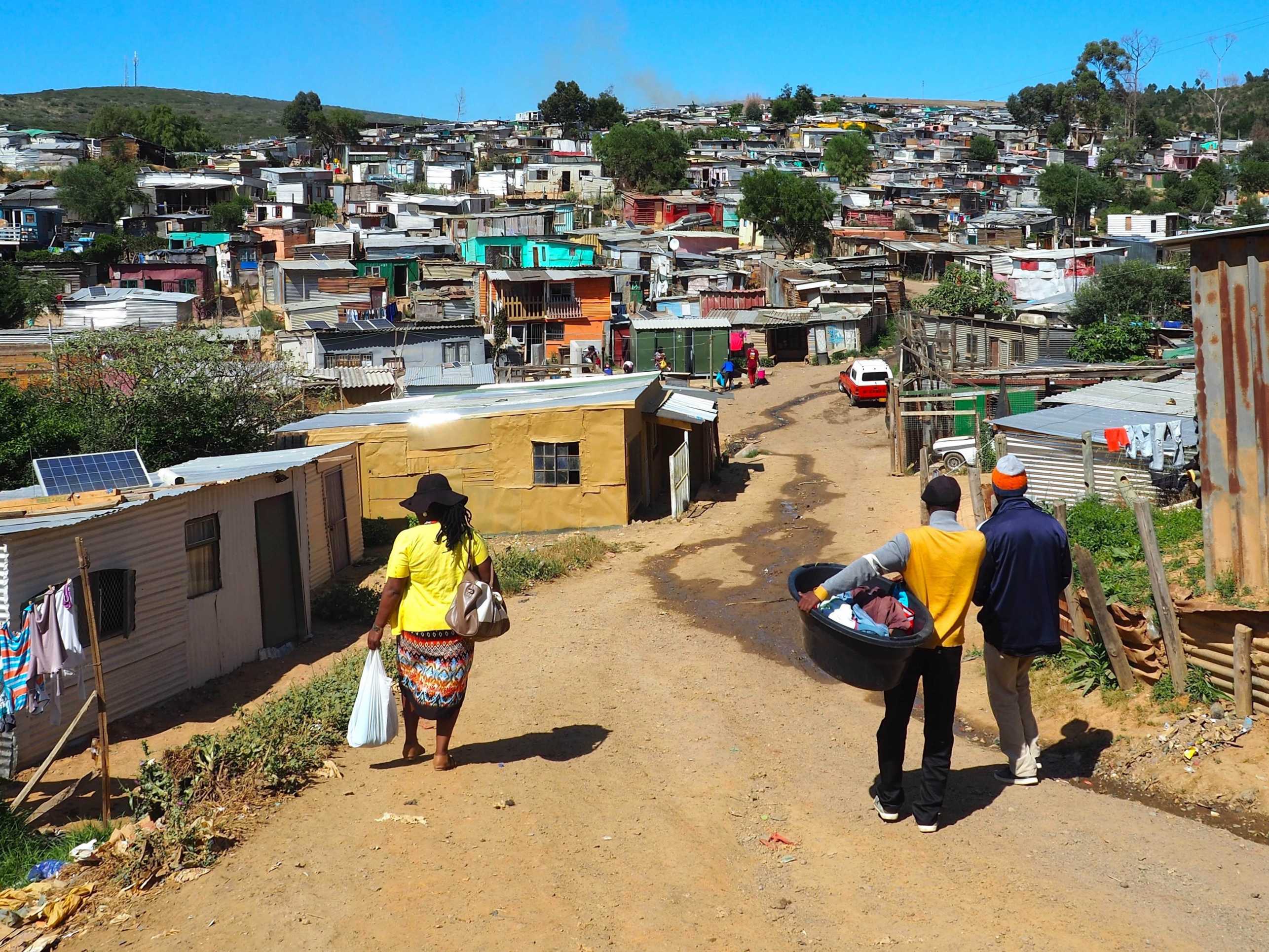 People walking in informal settlement